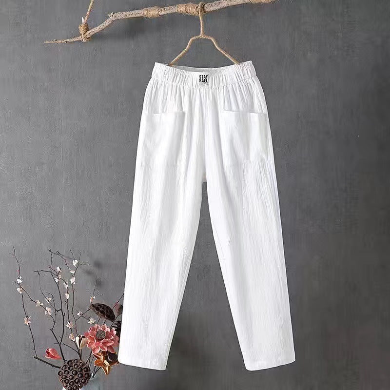 Ladies casual linen blend trousers with elastic waistband, straight leg, and large patch pockets Mune Fashion