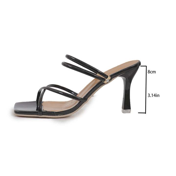 Ladies' elegant slip-on mule with narrow patent straps, square toe area, and high stiletto heel Mune Fashion