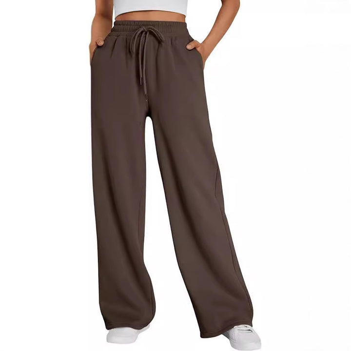 Women's wide lounge pants with high elastic waistband, adjustable drawstring and flowing palazzo silhouette Mune Fashion