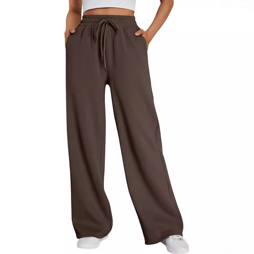 Women's wide lounge pants with high elastic waistband, adjustable drawstring and flowing palazzo silhouette Mune Fashion