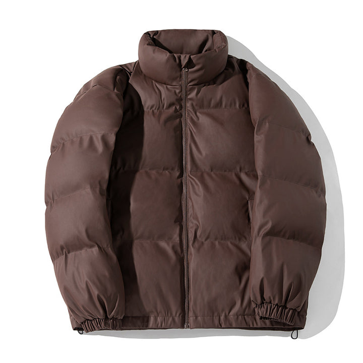 Unisex Boxy-Puffer Jacket with matte finish, high stand-up collar and adjustable drawstring hem Mune Fashion