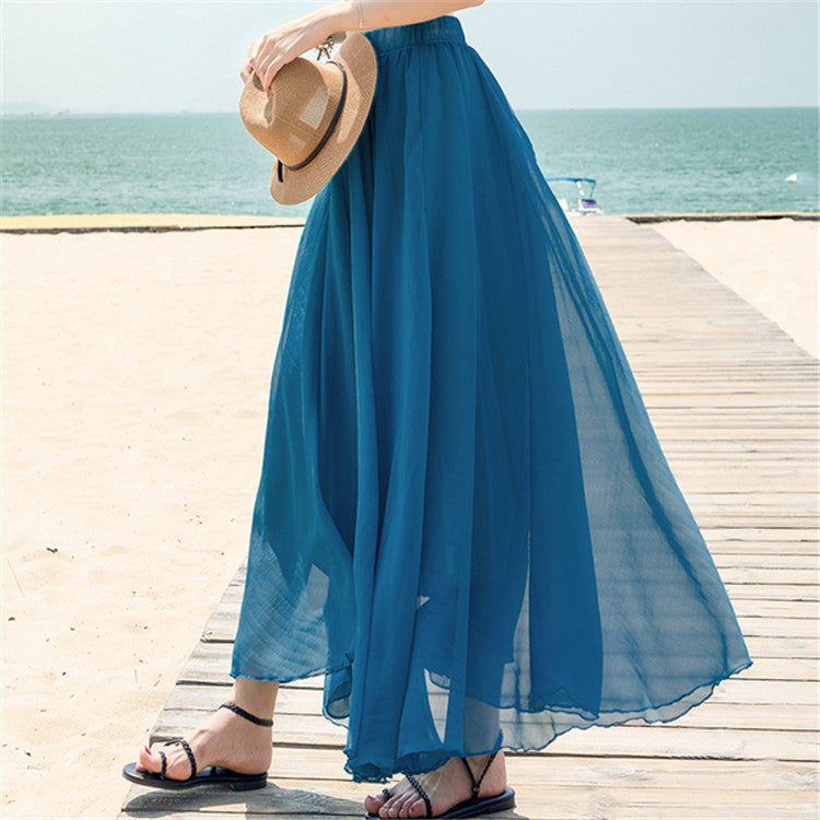 Women's flowing maxi skirt made of chiffon with elastic waistband and layered ruffle Mune Fashion