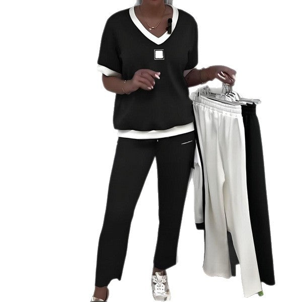 Ladies nan legeres two-piece set with V-neck and side stripes Mune Fashion