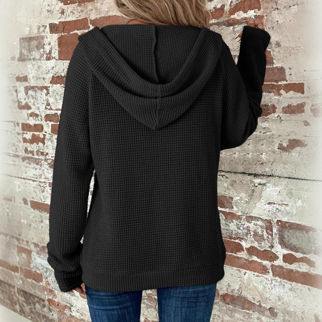 Women's waffle knit hooded jacket with zipper, kangaroo pockets, and relaxed silhouette Mune Fashion
