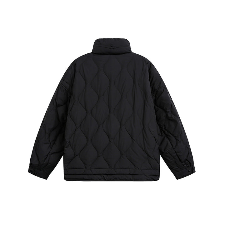 Women's oversized quilted jacket with stand-up collar, wave quilting, and drawstring hood