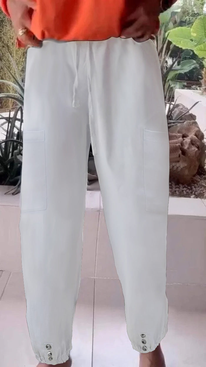 Ladies cargo jogging pants with drawstring, patch pockets and button cuffs Mune Fashion