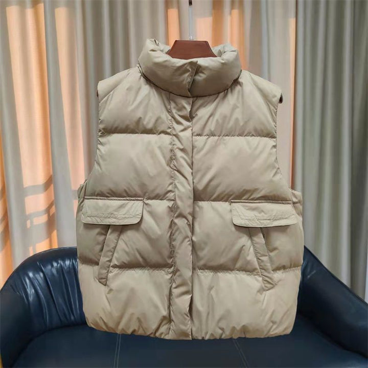 Women's quilted thermal vest with high stand-up collar and patch flap pockets Mune Fashion