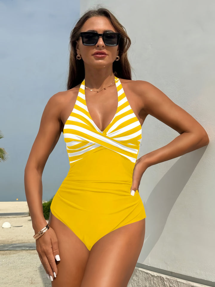Women's one-piece swimsuit with elegant wrap design and vertical stripes Mune Fashion
