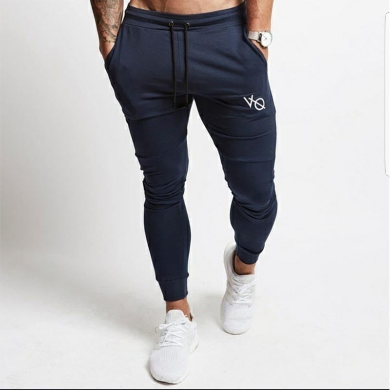 Men's narrow cut jogging pants with elastic waistband and drawstring Mune Fashion