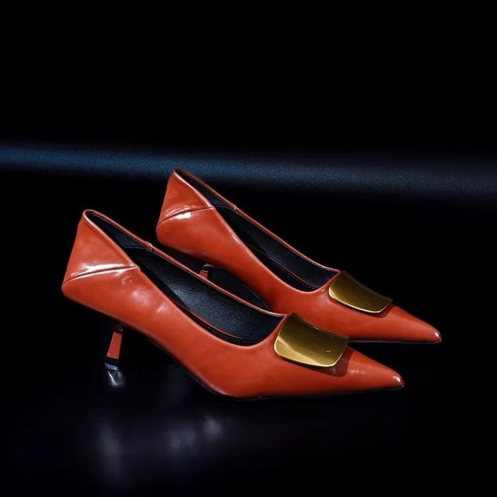 Women's pointed patent pumps with low kitten heel and decorative metal application Mune Fashion