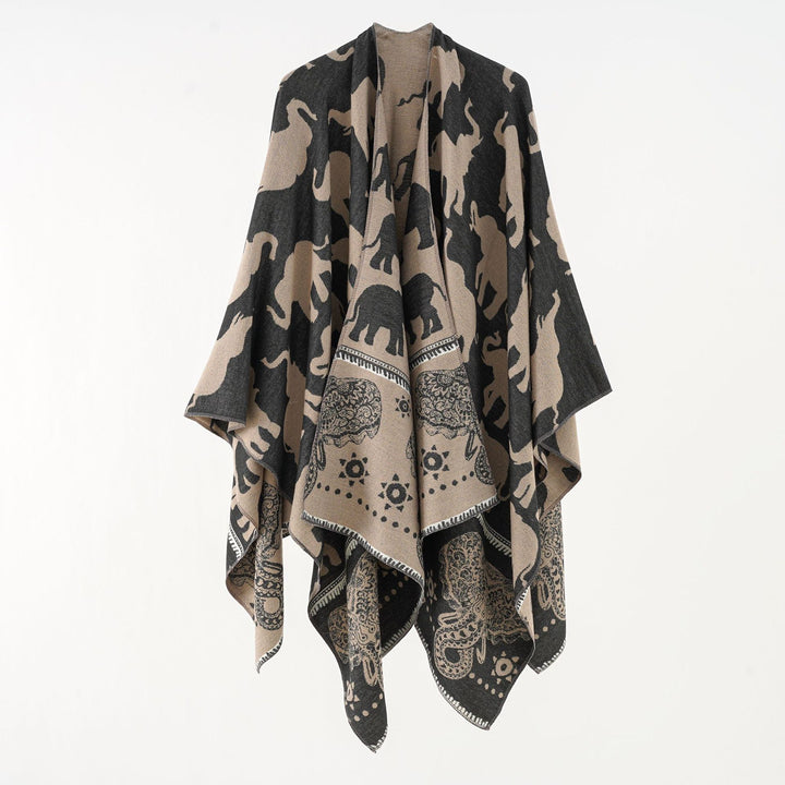 Ladies Jacquard Ruana with elephant motif and ornamental border Mune Fashion