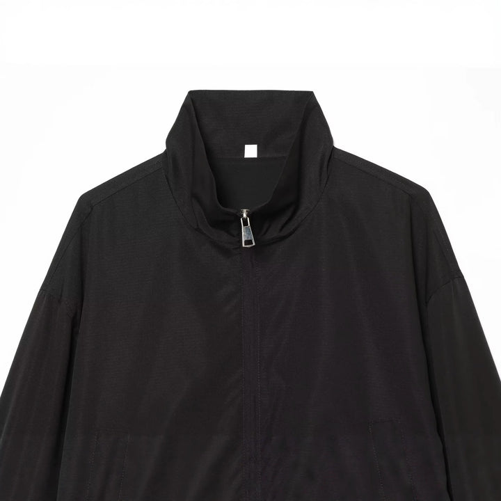 Women's lightweight adjustable windbreaker with stand-up collar, drawstring and tulle trim Mune Fashion