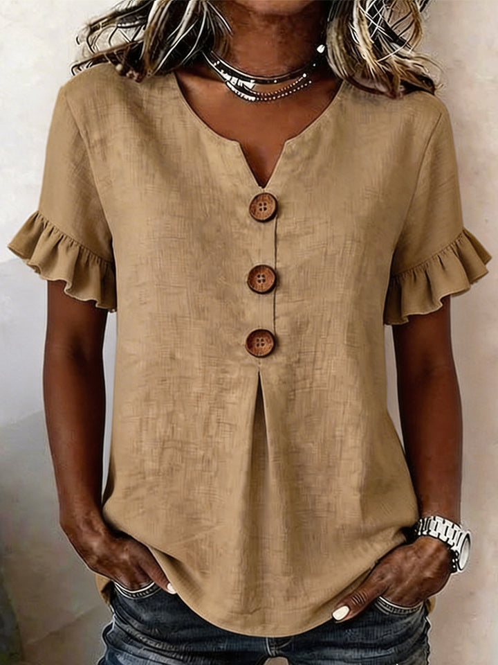 Women's top with ruffled hems and button details Mune Fashion