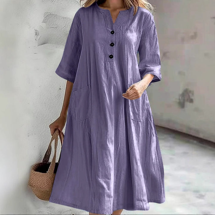 Women's casual falling A-line dress with V-neck button placket, 3/4 sleeves and patch pockets Mune Fashion