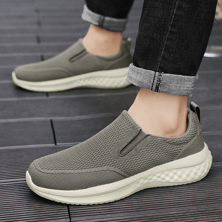 Unisex seamless slip-on sneakers with viscoelastic insole, flexible cushioning sole, and breathable knit upper Mune Fashion