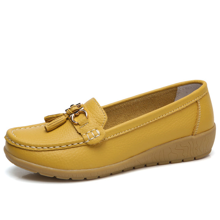 Women's classic tassel moccasin made of textured synthetic leather with padded comfort insole and flexible wedge sole Mune Fashion