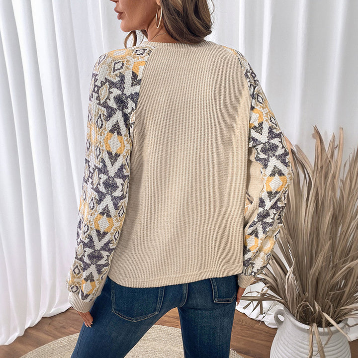 Ladies knit sweater with eye-catching sleeve design Mune Fashion
