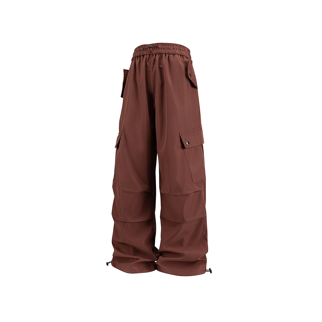 Men's Loose Utility Cargo Pants with Drawstring Waistband, Flap Pockets, and Adjustable Hem Closures Drune