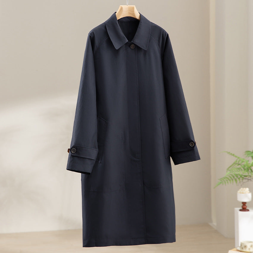 Women Mid-Length Trench Coat with concealed snap placket and adjustable cuffs Mune Fashion