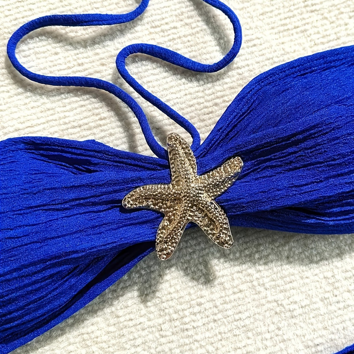 Women's bandeau bikini set with playful wrap skirt and sparkling starfish detail Mune Fashion
