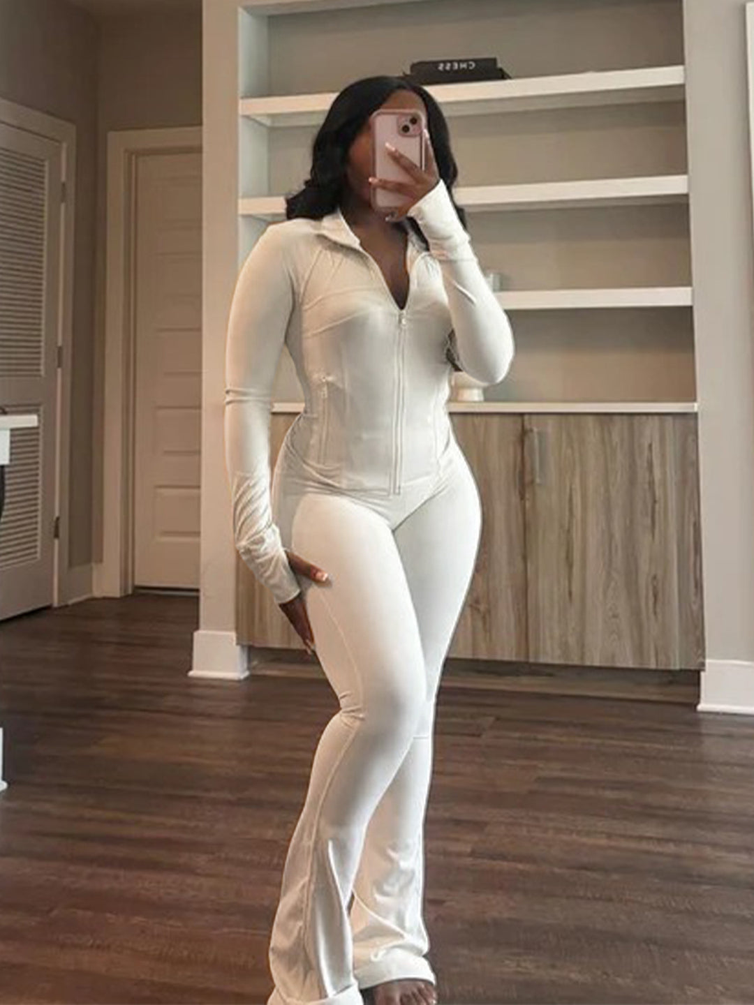 Women's figure-hugging tracksuit with zipper, high waist and flared leg Mune Fashion