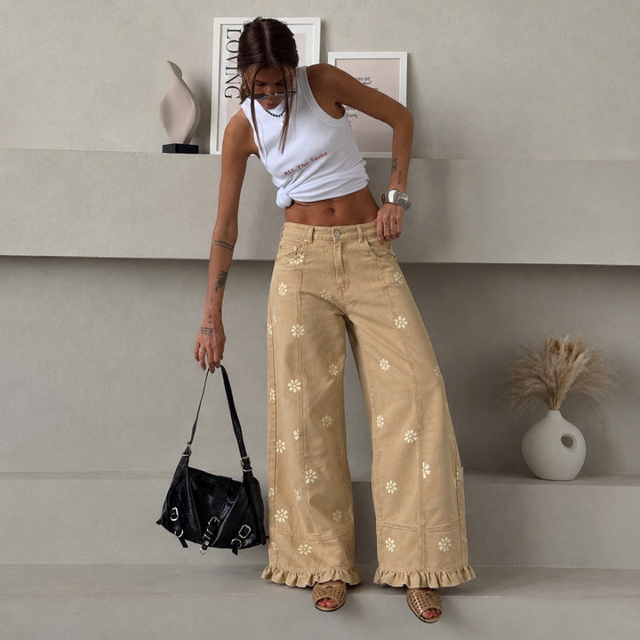 Women's wide denim pants with daisy print, high waist and ruffled hem Mune Fashion
