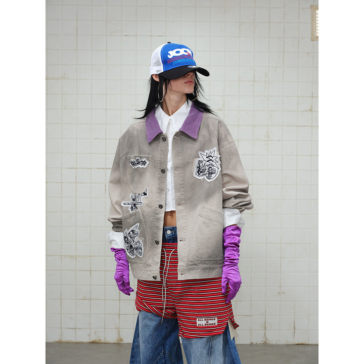 Unisex Traditionally tailored chore jacket made of cotton canvas with artistic patch applications and cord collar Mune Fashion