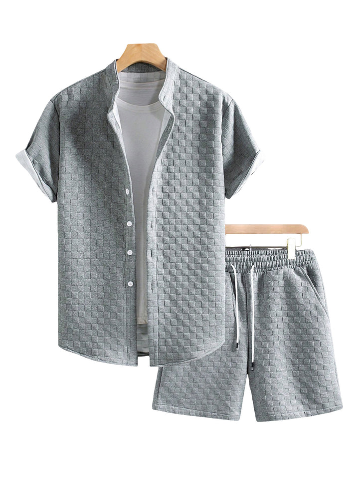 Men's two-piece summer ensemble with stand-up collar shirt jacket and elastic comfort shorts in embossed checked texture Mune Fashion