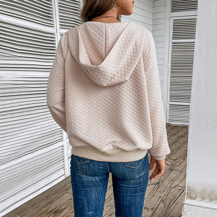 Women's quilted hoodie with half zipper, kangaroo pocket and quilted texture Mune Fashion