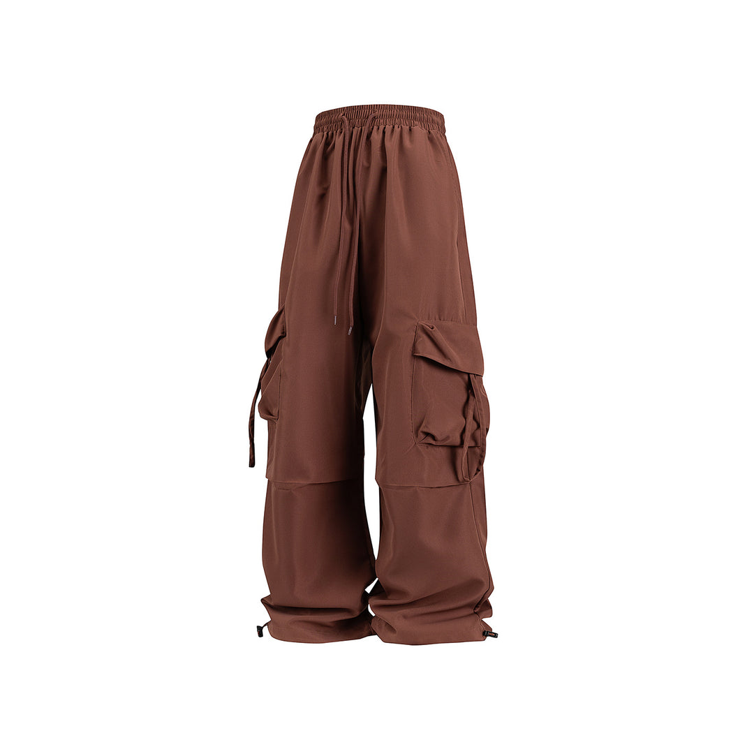 Unisex Wide Cargo Pants in Baggy Cut with Drawstring Waistband, Multiple Flaps, and Adjustable Leg Closures Drune