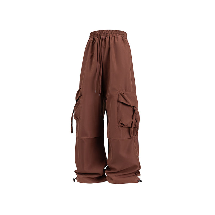 Unisex Wide Cargo Pants in Baggy Cut with Drawstring Waistband, Multiple Flaps, and Adjustable Leg Closures Drune