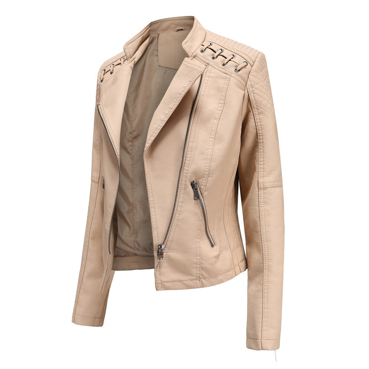 Ladies tailored faux leather biker jacket with quilted shoulder section, asymmetrical zipper and decorative eyelets Mune Fashion