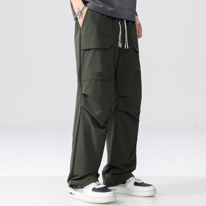 Men's Oversized Cargo Pants made of lightweight functional fabric with drawstring waistband and multiple pockets Mune Fashion