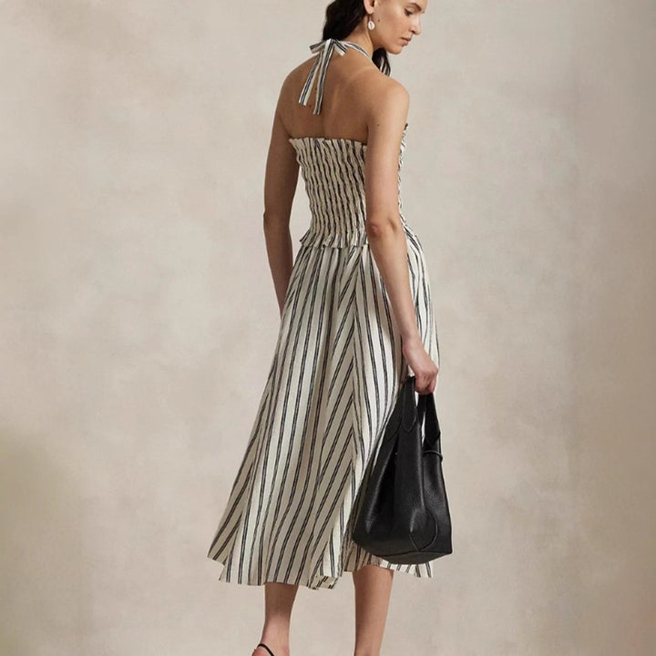 Women's midi dress with gathered smock top, removable halter neck and side pockets Mune Fashion