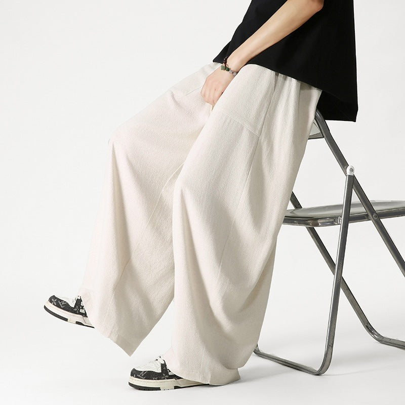 Men's loose-fitting lounge pants with tassel cord, elastic waistband, and patch pockets Mune Fashion
