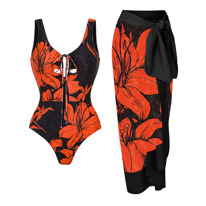 Women's swimsuit with asymmetric cut and floral accents Mune Fashion