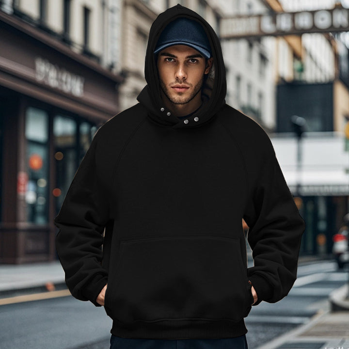 Men's oversized hoodie with kangaroo pocket, raglan sleeves, and ribbed cuffs Mune Fashion
