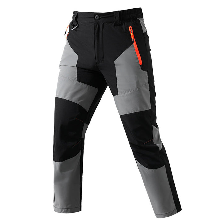 Men's multifunctional trekking pants with multi-way stretch knee reinforcement and elastic waistband.