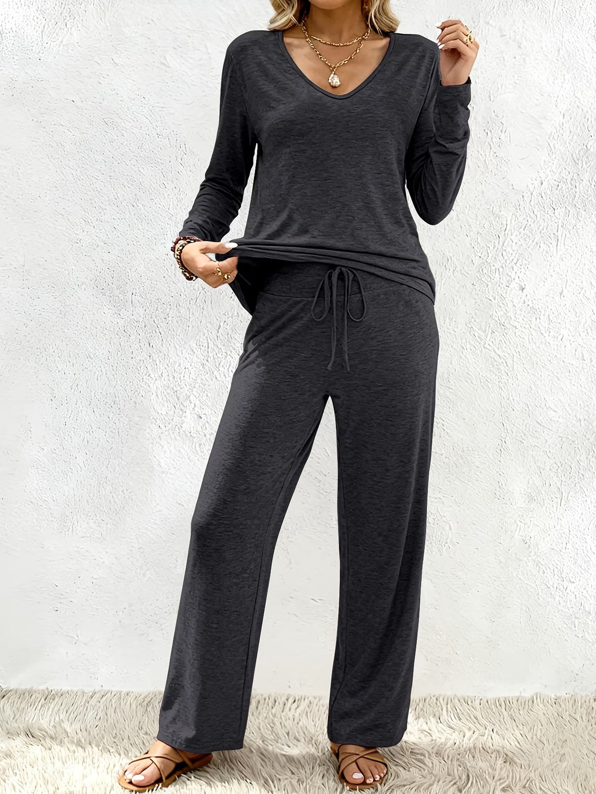 Women’s lounge set made of soft viscose-modal blend with V-neck, drawstring pants, and wide leg Mune Fashion