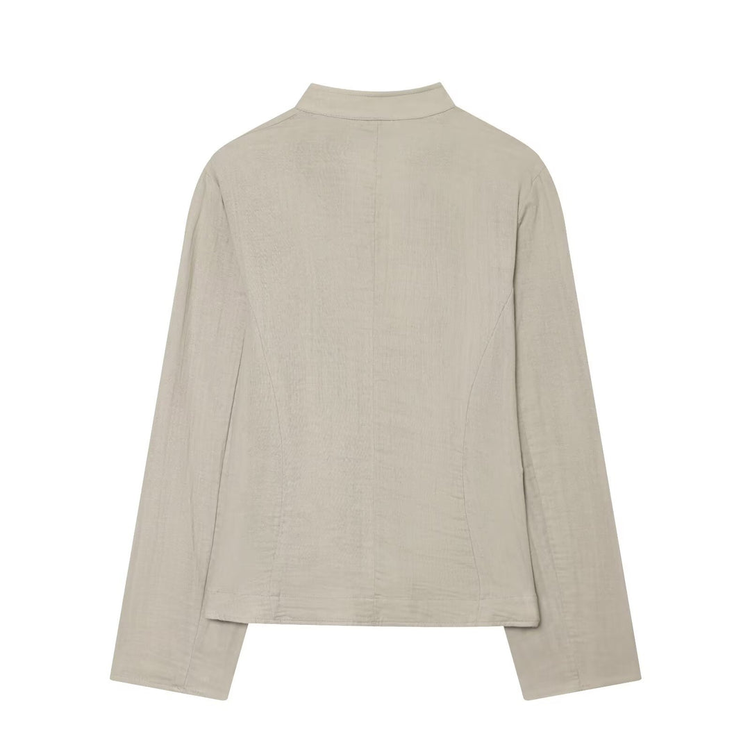 Women's short blazer with stand-up collar, decorative button placket, and rounded hem Mune Fashion