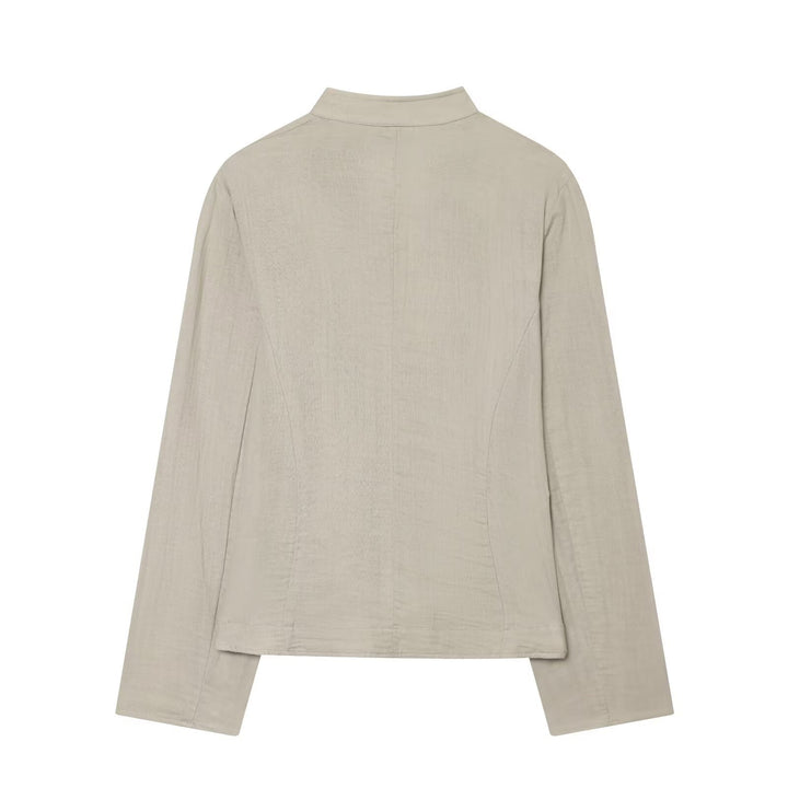 Women's short blazer with stand-up collar, decorative button placket, and rounded hem Mune Fashion