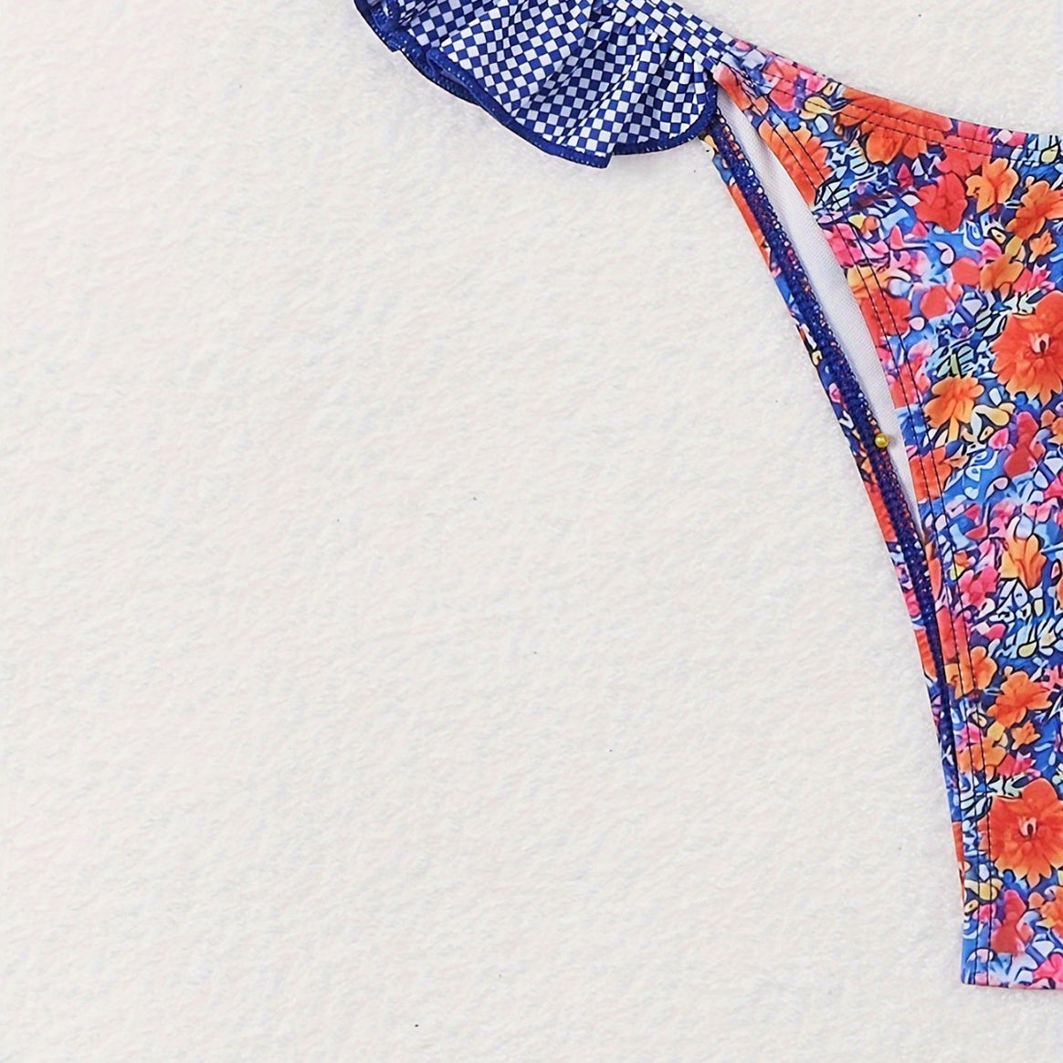 Women's triangle bikini with playful ruffle details and floral pattern Mune Fashion