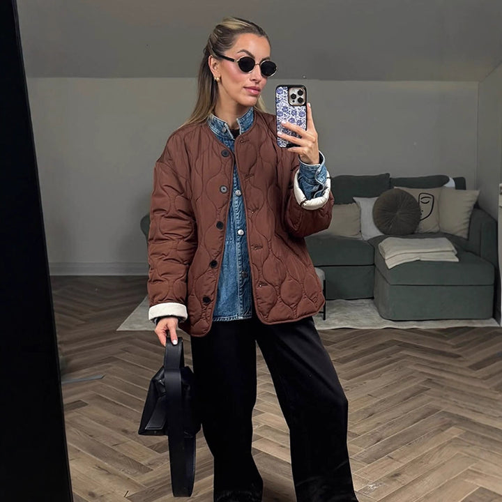 Women's quilted transitional jacket with round quilting, boxy silhouette and press stud placket Mune Fashion