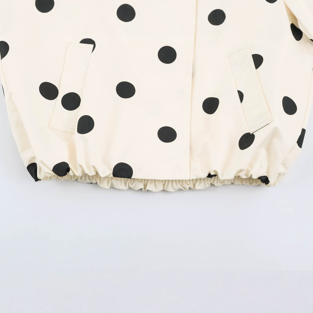 Women's dotted short jacket with high stand-up collar, elastic hem, and practical side pockets Mune Fashion