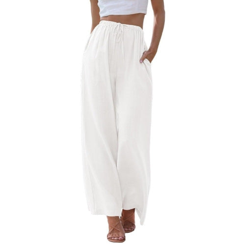 Women's wide linen pants with elastic waistband, drawstring, and side pockets Mune Fashion