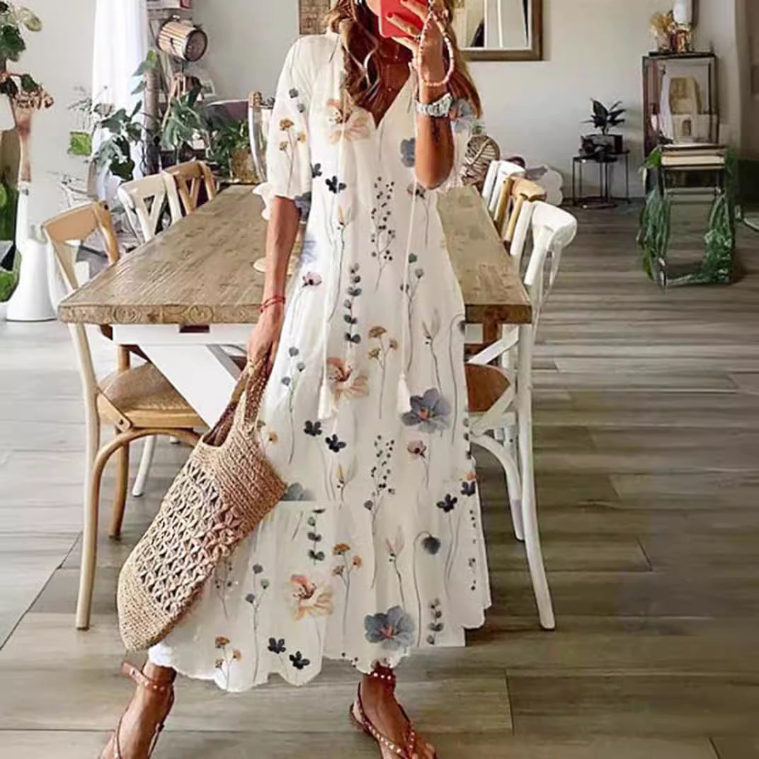 Women’s airy maxi dress in A-line with V-neck, casual rolled sleeves and floral all-over print Mune Fashion