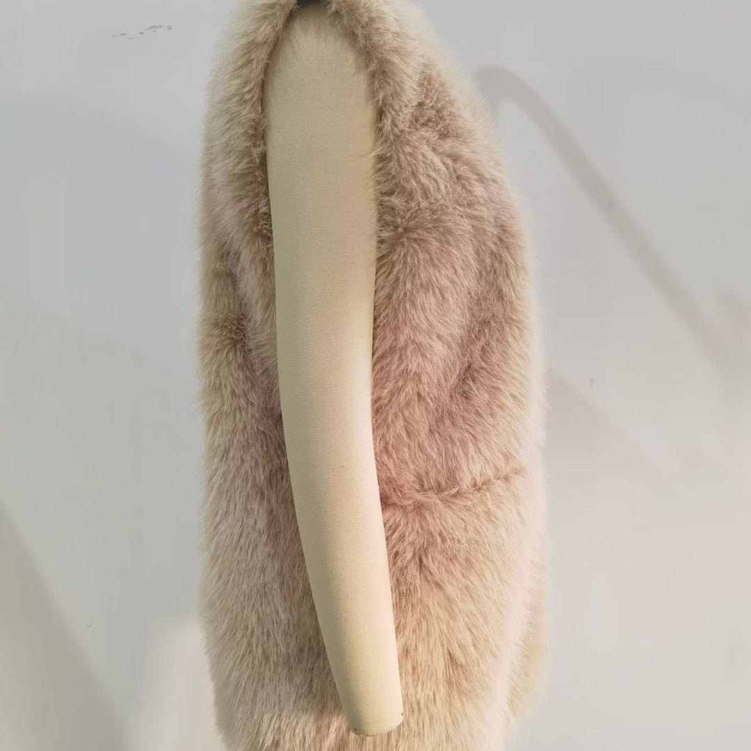 Women's luxurious faux fur vest with toggle closure and voluminous stand-up collar Mune Fashion