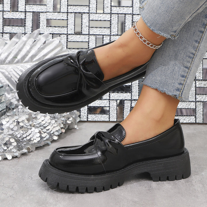Women’s shiny platform loafers with oversized bow appliqué and profiled rubber sole Mune Fashion