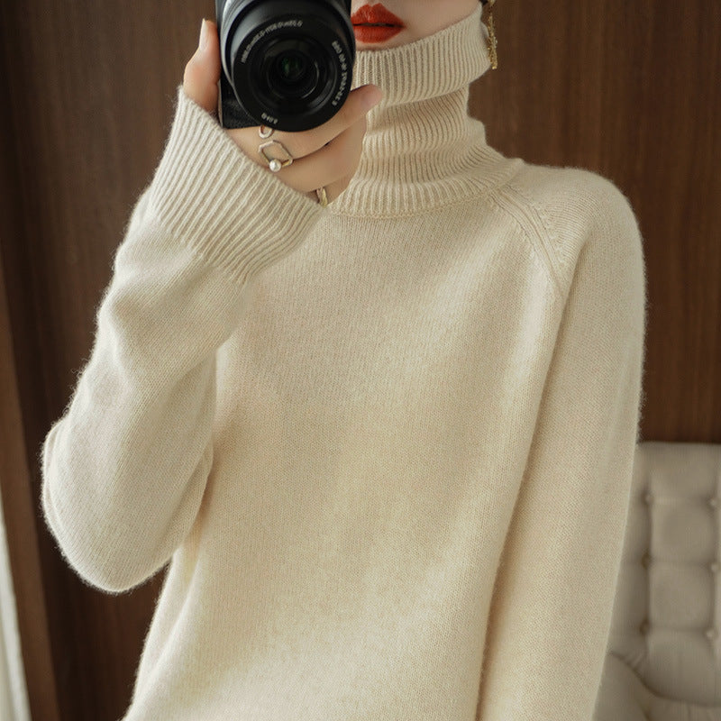 Women's turtleneck sweater made of soft wool blend with extended cuffs Mune Fashion
