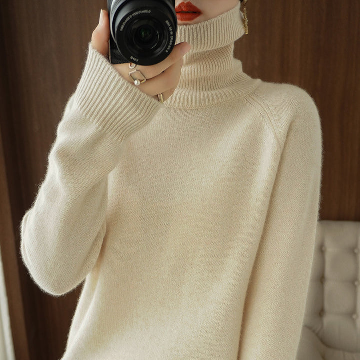 Women's turtleneck sweater made of soft wool blend with extended cuffs Mune Fashion